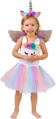 A young girl wearing a unicorn costume with wings and a tutu.