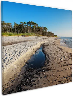 Produktbild von Wallario Premium Leinwandbild Einsamer Strand am Meer - Blauer Himmel in Größe 50 x 50 cm