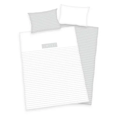 A neatly folded baby bedding set with a pillow and duvet cover, both featuring a subtle gray stripe pattern.
