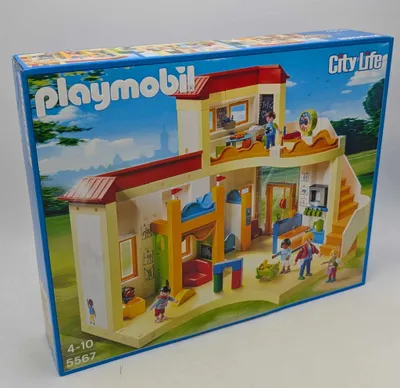 A Playmobil City Life playset box, showing a model of a daycare center with figures.