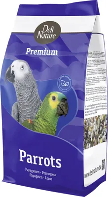 A bag of parrot food with images of parrots on the front.