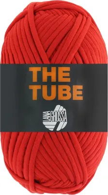 A ball of red yarn with a black label.