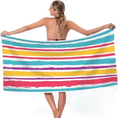Produktbild von Famanu Strandhandtuch 180 x 75 cm - Mikrofaser, schnelltrocknend, Regenbogen