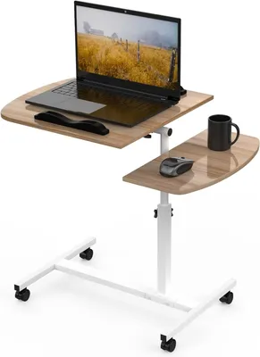 A mobile laptop table with two tiers, a laptop, a mouse, and a mug on a white background.