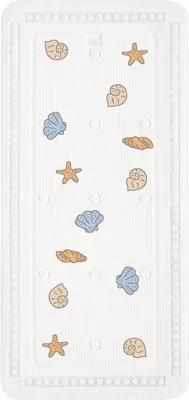 A white bath mat with a pattern of seashells and starfish.