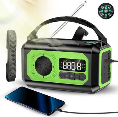 A product shot of a multi-functional emergency radio with a smartphone charging.
