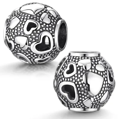 Immagine prodotto di MATERIA by Matthias Wagner Ciondolo a forma di cuore in argento anticato traforato, argento 925, per bracciale o collana con perline 276
