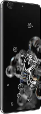 A close-up of a smartphone with water droplets on the screen, against a black background.