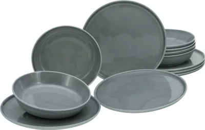 A collection of grey ceramic plates and bowls arranged on a white background.