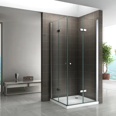 A modern bathroom with a glass shower enclosure.
