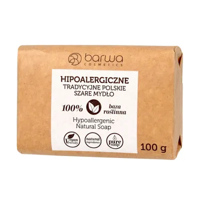 A bar of soap wrapped in brown paper packaging, with text and icons on the front.