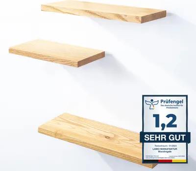 Three wooden shelves mounted on a white wall, with a certification badge in the lower right corner.