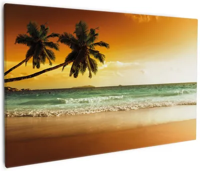Produktbild von Wallario Premium Leinwandbild Palmen am Sandstrand bei untergehender Sonne in Größe 60 x 90 cm
