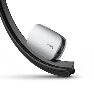A silver Baseus product is shown resting on a black curved object, against a white background.