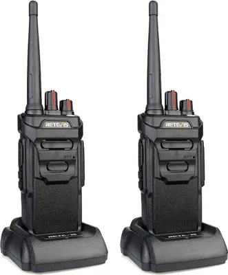 Two black Retevis RT648 walkie-talkies are shown in their charging docks against a white background.