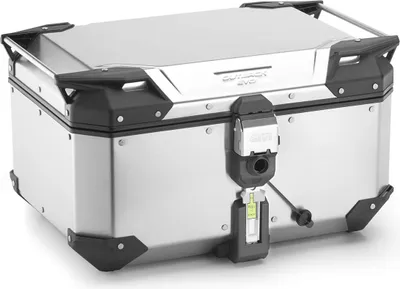 A silver and black motorcycle top case is shown against a white background.