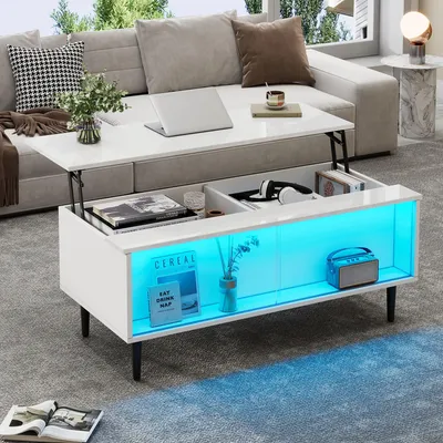 A modern living room with a sectional sofa and a white coffee table with LED lighting.