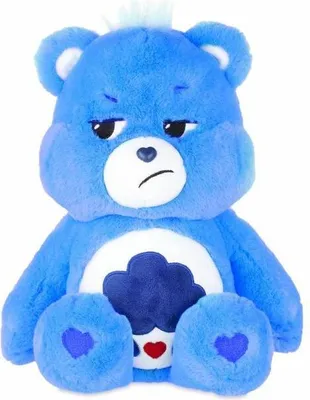 A blue plush toy bear with a grumpy expression, sitting against a white background.