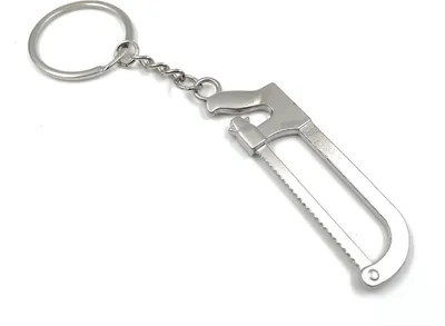 Immagine prodotto di Onwomania sega seghetto in metallo portachiavi portafortuna in scatola regalo in alluminio, ideale come regalo
