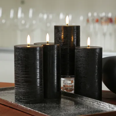Produktbild von LED Kerzenset PIA - Rustik-Optik - H: 15cm - inkl. Batterien und Fernbedienung - schwarz - 4er Set