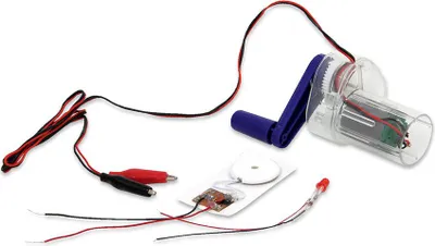 Produktbild von Betzold Handdynamo Lernspielzeug zur Demonstration einfacher Stromerzeugung mit LED und Melodie