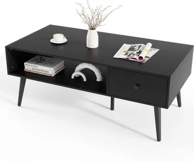 A black coffee table with a drawer and open shelf, displayed on a white background.