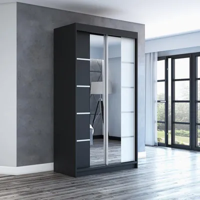 A modern black sliding door wardrobe with mirrored panels is shown in a room with a gray textured wall and wooden floor.