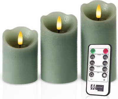 Immagine prodotto di Set di 3 candele a LED Meisterhome® - Candele a LED - Candele senza fiamma dal design rustico - Ø 7,5 cm, altezze 10/12,5/15 cm - Luce bianca calda e tremolante - Con telecomando e timer - Funzionamento a batteria, colore:Verde