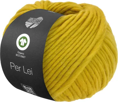 A ball of yellow yarn with a black label wrapped around it.