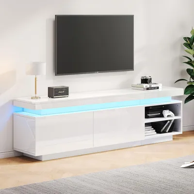 Obrázek produktu pro Sweiko moderní nízká TV skříňka s vysokým leskem a LED osvětlením, TV deska, TV komoda, vhodná pro 70palcové televizory, stolek, univerzální herní stojan na média, úložná skříňka a velký úložný prostor, bílá barva