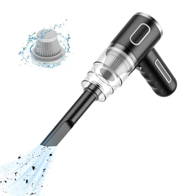 A black and silver handheld vacuum cleaner with a transparent dustbin, shown with a filter and debris being sucked up.