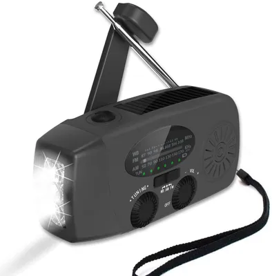 A black emergency radio with a flashlight and solar panel.