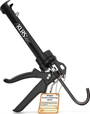 A black caulking gun is shown against a white background.