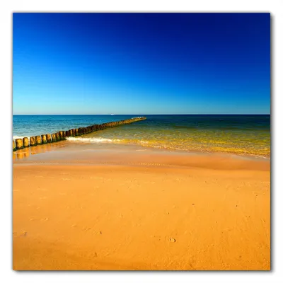 Produktbild von Wallario selbstklebende Möbelfolie/ Tischdecke für Innen und Außen, Größe: 70 x 70 cm - Sandstrand in orange - Blaues Meer - Blauer Himmel