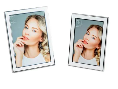 Two silver and white photo frames with pictures of a woman inside, displayed on a white background.