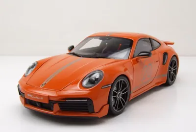 Produktbild von Minichamps 113069074 Porsche 911 992 Turbo S Coupe Sport Design 2021 orange 1:18