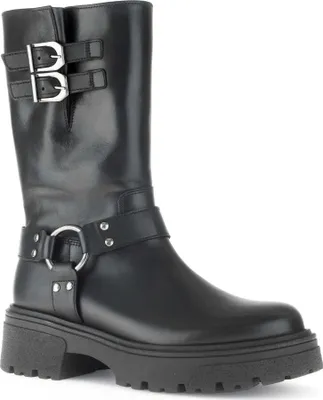 A black leather boot with buckles and a thick sole, shown from the side against a white background.