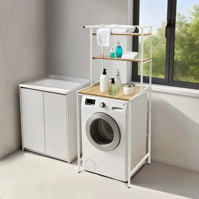 Immagine prodotto di Scaffale portaoggetti da posizionare sopra la lavatrice/asciugatrice - 3 ripiani - Con cesto portabiancheria - MDF e ferro - 10 kg per ripiano - Piedini regolabili di 1 cm - Bianco effetto legno