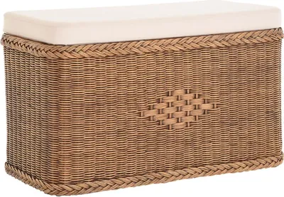 A wicker storage bench with a cream-colored cushion.