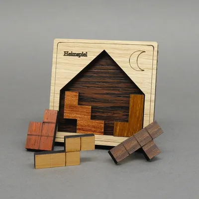 Produktbild von HEIMSPIEL - kleines, schwieriges Holzpuzzle