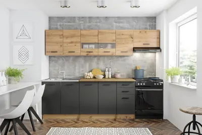 A modern kitchen setting with dark gray cabinets and light wood upper cabinets.