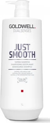 A white bottle of Goldwell Dualsenses Just Smooth Taming Shampoo with a pump dispenser, shown against a white background.