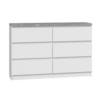 A white dresser with a gray countertop against a white background.