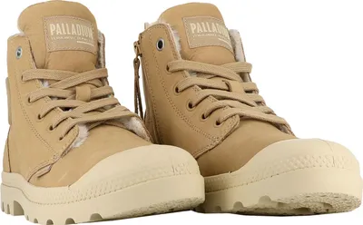 A pair of beige Palladium winter ankle boots.