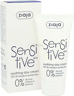 A product shot of a tube of cream and its box.