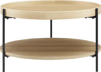 A two-tiered round coffee table with a light wood finish and black metal legs, presented against a white background.