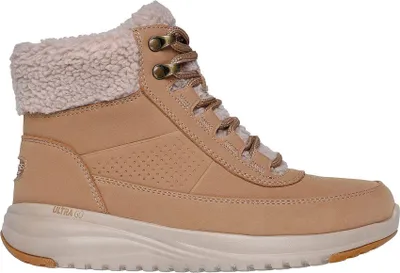 A single brown Skechers boot with a fluffy lining is shown against a white background.