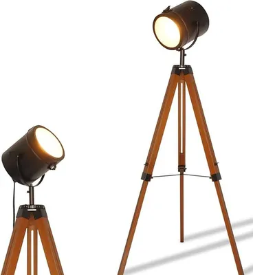 Two cinema tripod floor lamps are shown against a white background. One lamp is in the foreground on the left, and the other is larger and in the midground on the right.