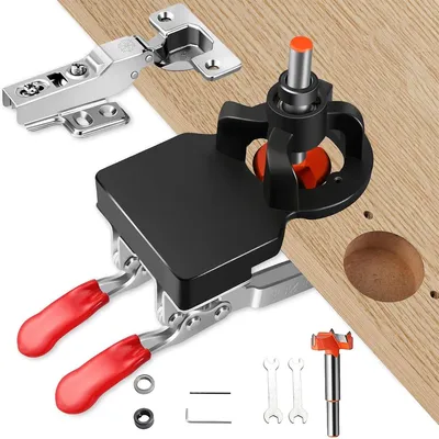 A jig for drilling holes for concealed hinges is shown on a wooden surface, with a hinge and drill bit also visible.