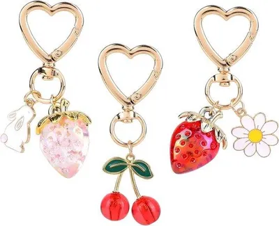 Immagine prodotto di Simpatici portachiavi a forma di frutta con chiusura a cuore, set da 3 pezzi